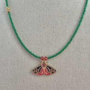 Whimsical Green Beaded Necklace with Pink and Gold Moth Pendant